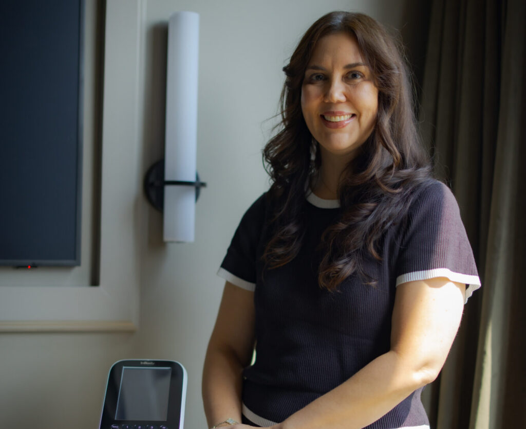 Woman standing in front of InBody machine